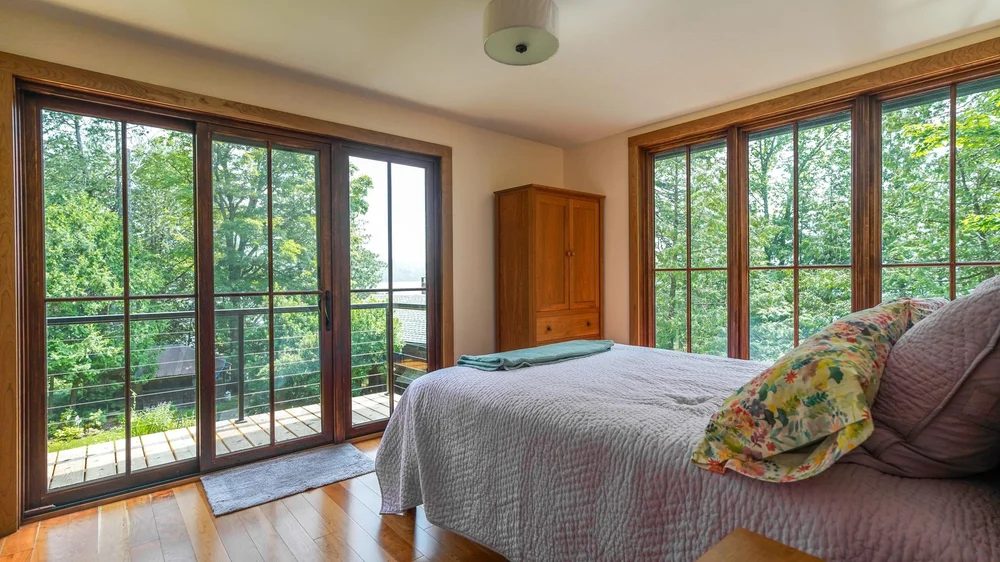 Gunther Accessory Dwelling — Bedroom opening to the deck