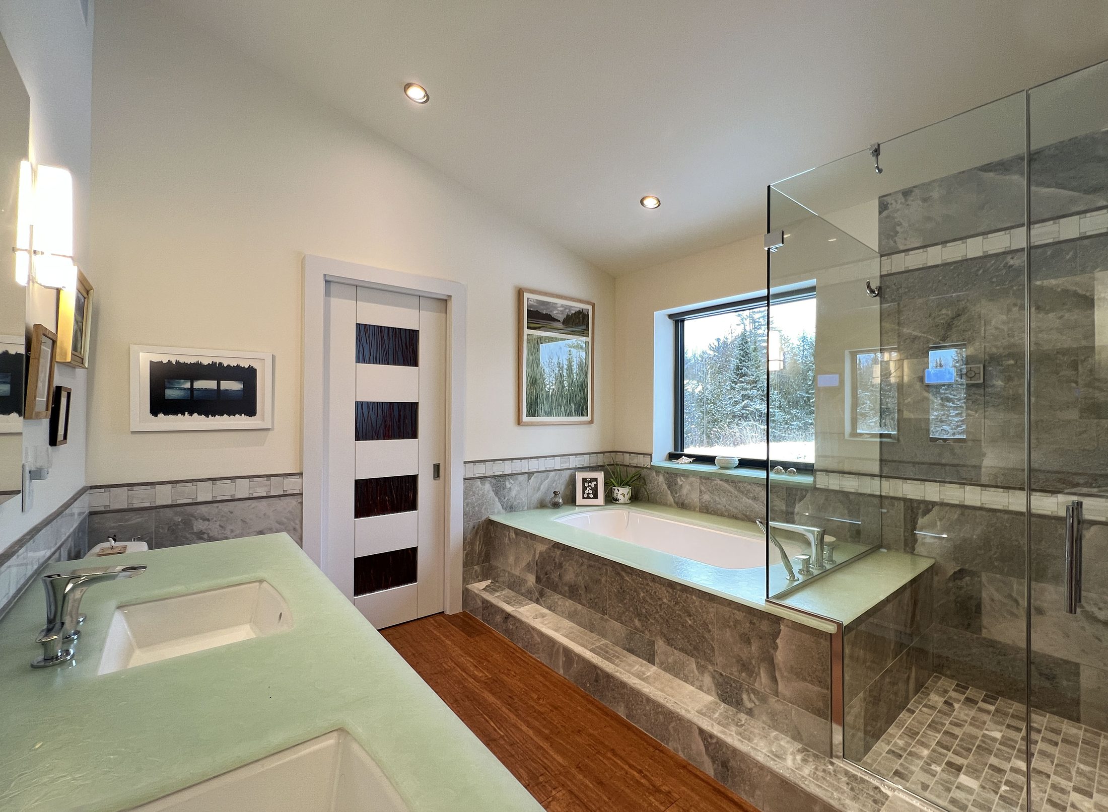 Steel Residence — Primary bath with stone tub surround
