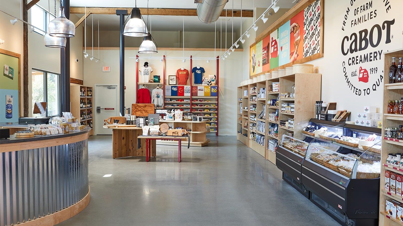 Yellow Barn — Visitor store beneath the original frame