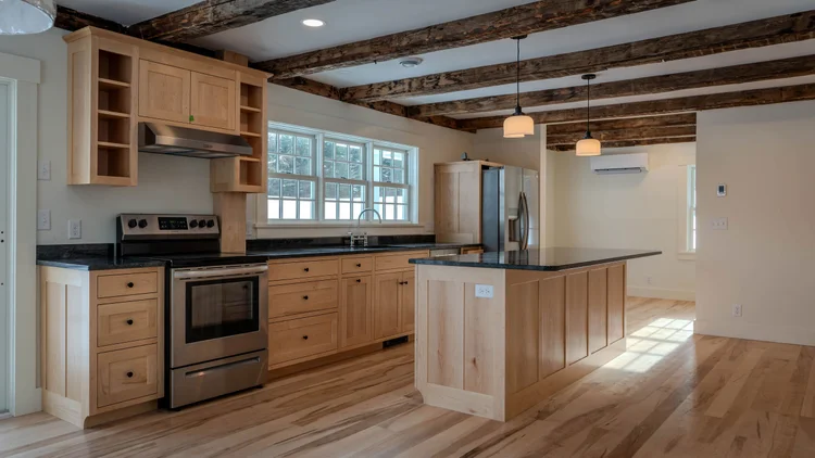 Ingersoll Lane — Kitchen with maple cabinets and island