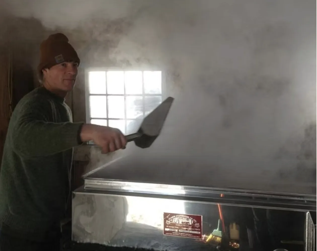 Firing the evaporator in the sugar house at Ledgenear Farm