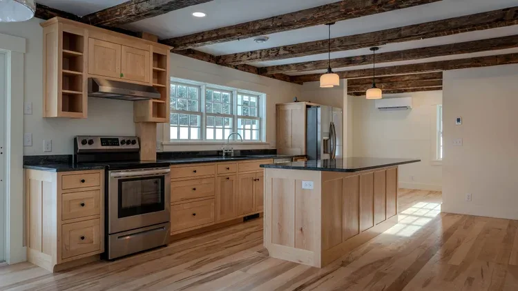 Ingersoll Lane — Kitchen with maple cabinets and island