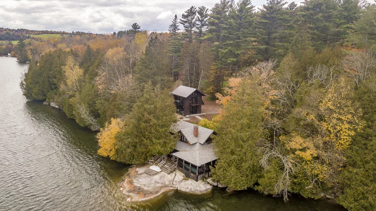 Gunther Accessory Dwelling — The dwelling and main house on the lake