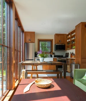 Gunther Accessory Dwelling — Sliding wall of glass at the dining table