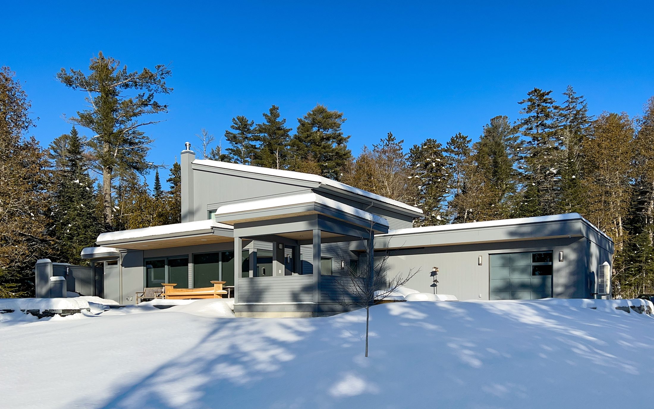 Steel Residence — Living wing under blue sky